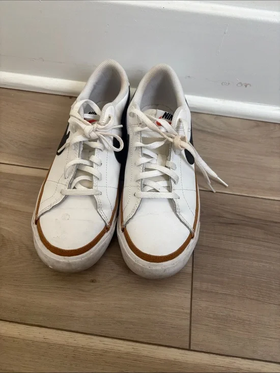 Nike White Sneakers with Black Swoosh and Brown Trim