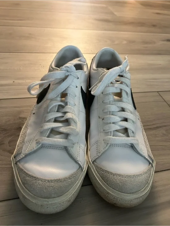 Nike White and Black Low-Top Sneakers with Yellow Tongue Accent