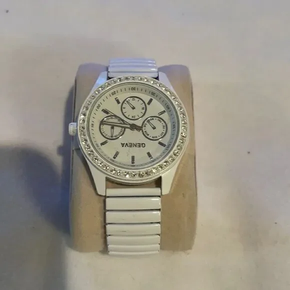 Geneva Ladies Analog Watch White Face Rhinestones White Metal Stretch Band