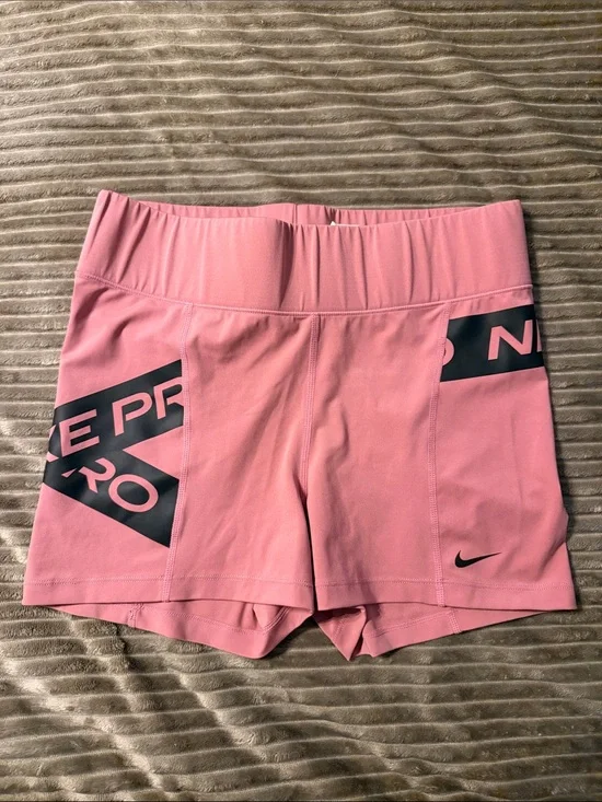 Nike Women’s Pink Athletic Running Shorts with Black Accents