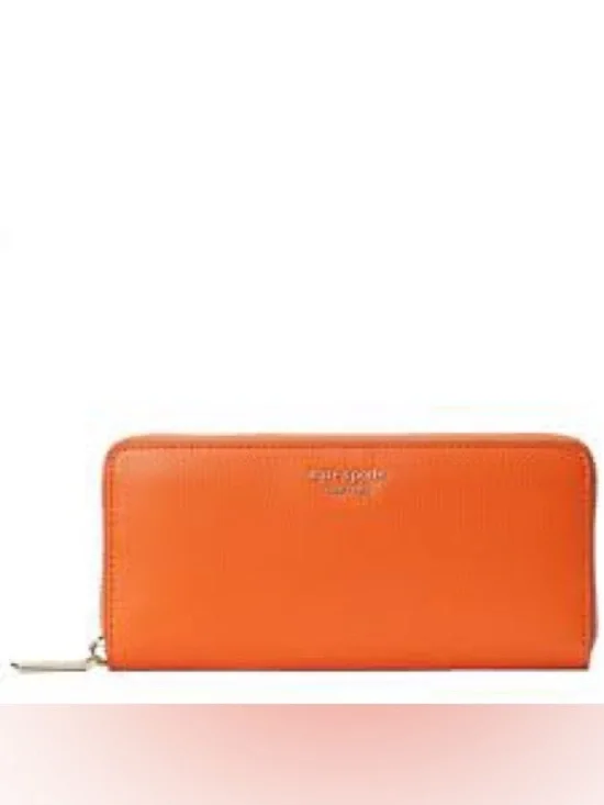 kate spade bright orange zip-around continental wallet