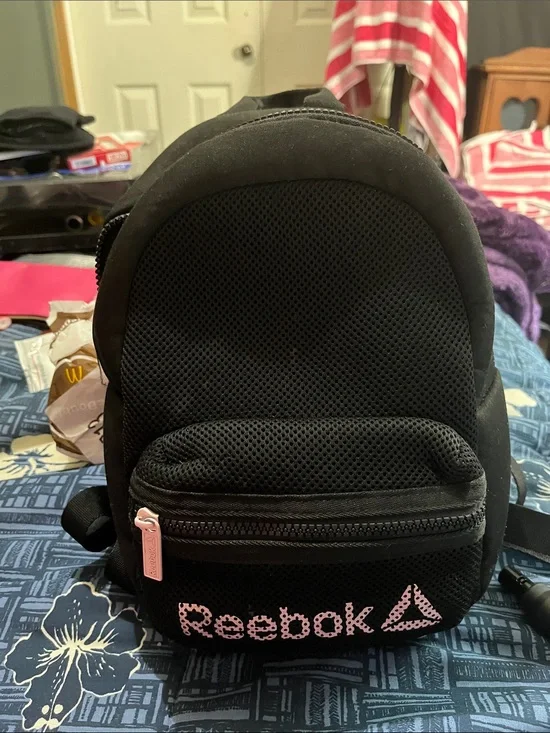 Reebok Black Mini Backpack with Pink Logo Accent