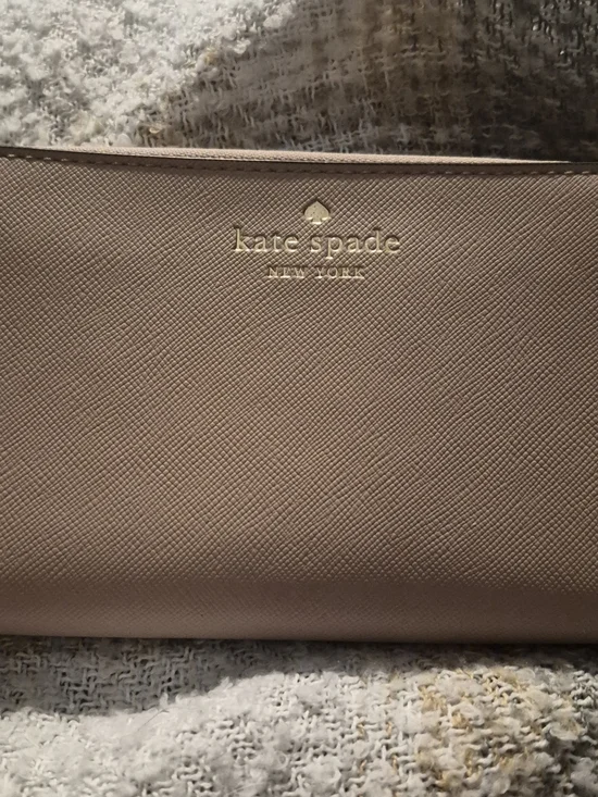 kate spade blush pink wallet with gold logo