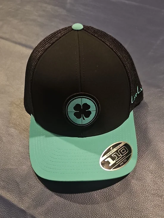 Black and Teal Clover Patch Trucker Hat