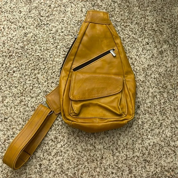 Genuine leather sling backpack