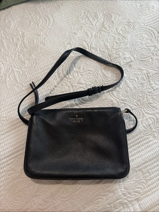kate spade black leather wristlet with gold zipper