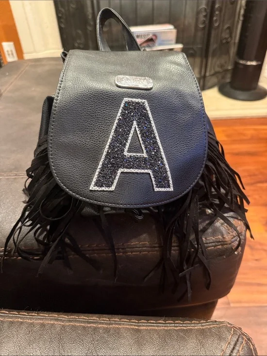 Black Fringe Faux Leather Mini Backpack with letter A from Justice