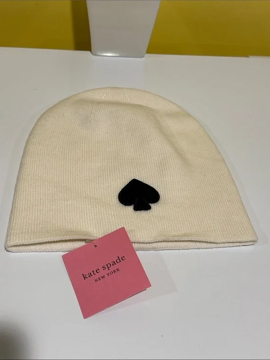 - NWT Kate Spade beanie hat. Color white  One size.