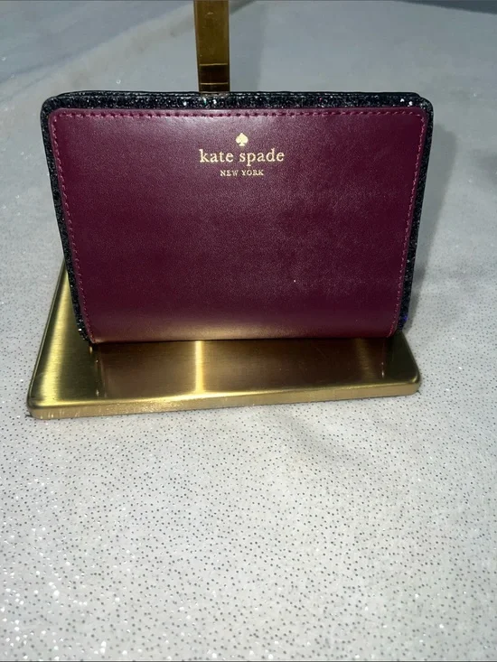 kate spade wallet in deep plum . EUC