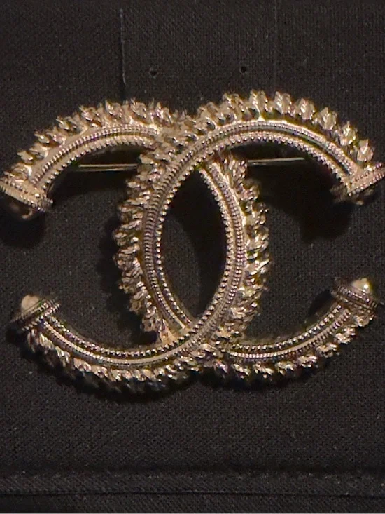LIKE NEW Chanel Gold Double-C Logo Brooch in gold tone. Box and card included.