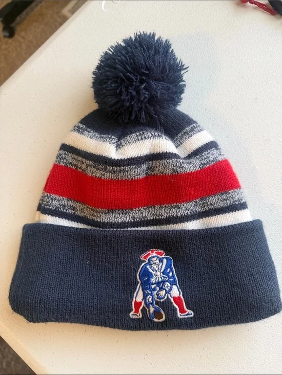New England Patriots Navy Red Stripe Pom Beanie with Embroidered Football Logo