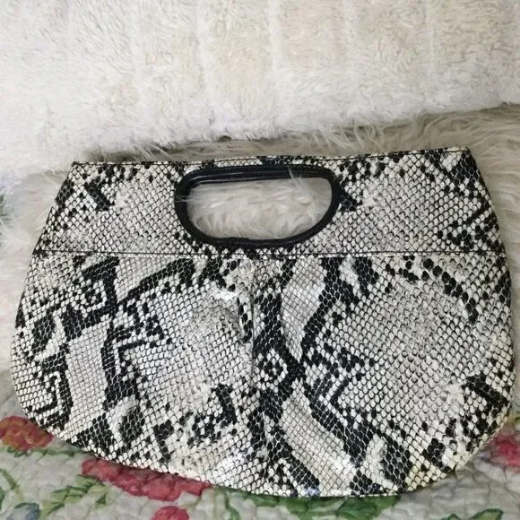 Carlos Falci clutch python look, vegan