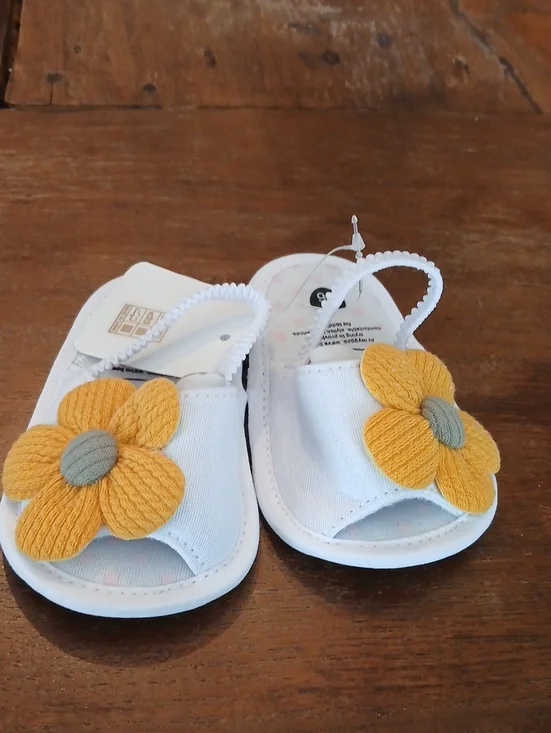 Infant White Sandals with Yellow Flower Accent