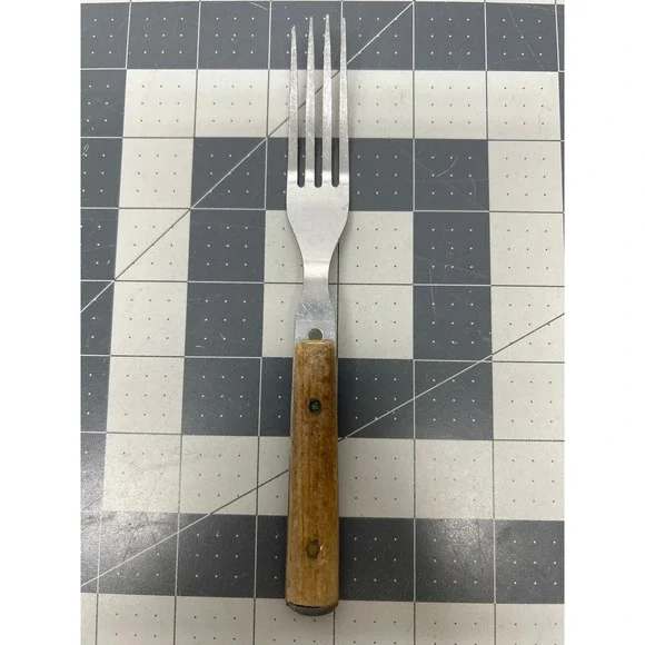 Vintage Dinner Fork Brown Wood Handle Stainless Steel Riveted Graduated Tines