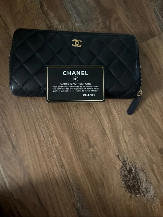CHANEL Black Quilted Zip Around Wallet with Gold CC