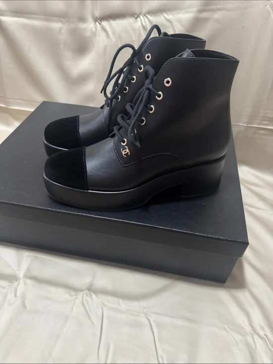CHANEL Black Leather Lace-Up Platform Ankle Boots with Gold Accents
