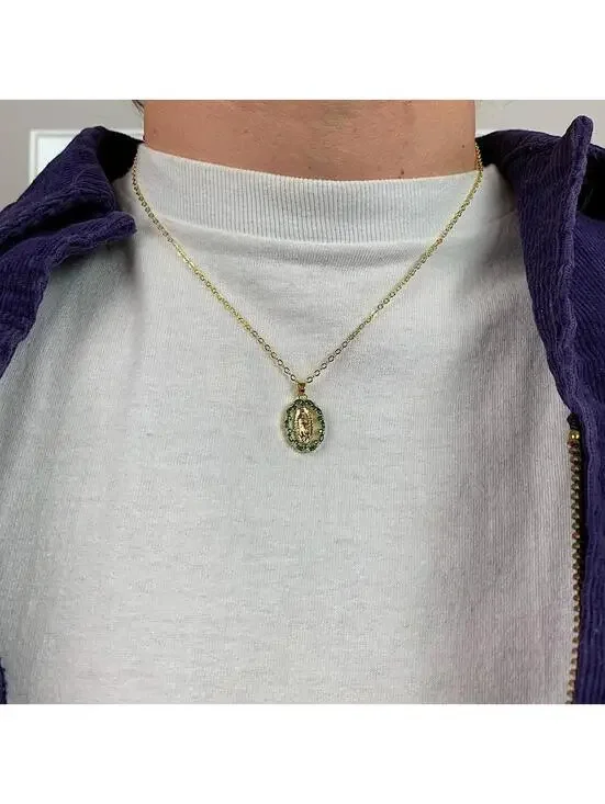 Y2k style gold Saint Marry green rhinestone pendant necklace. 19 inches length.