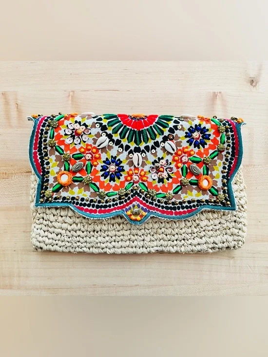 Hand-beaded bohemian-style straw clutch