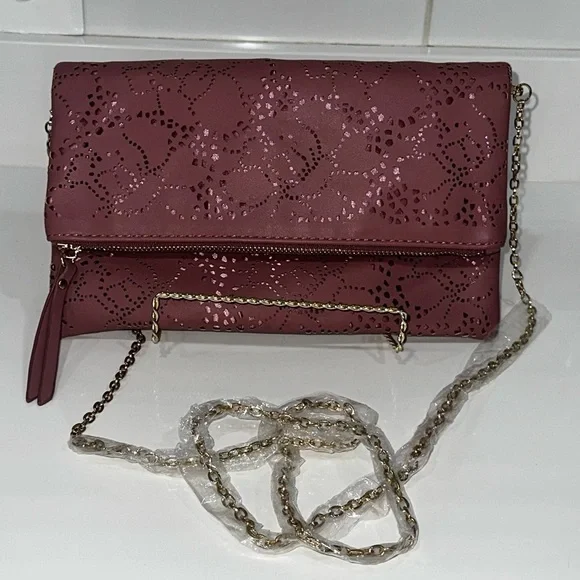 Urban Expressions Pink Laser Cut “Locket” Clutch. New without tags