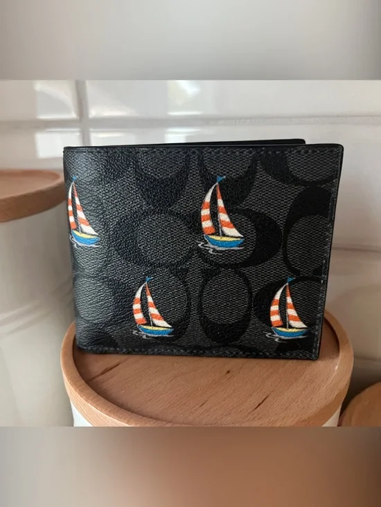 Coach Black Signature Canvas Men’s Bifold Wallet with Colorful Sailboat Motif