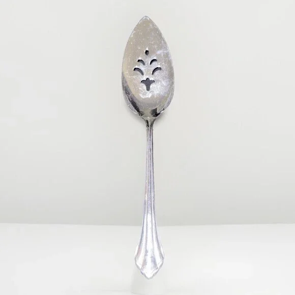 Oneida Community Royal Flute pierced pie server in stainless steel. 9.5”