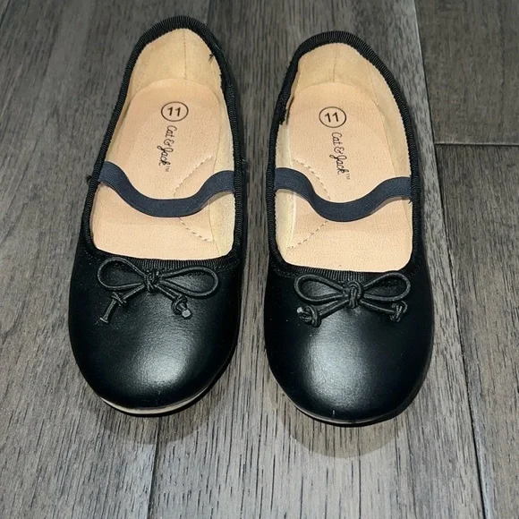 Gently used cat & Jack Mary Jane like flats with a string bow
