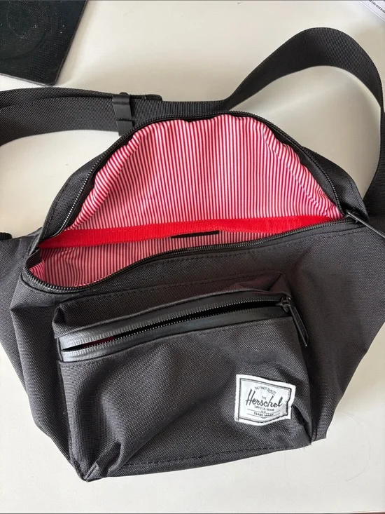 PERFECT Herschel Supply Company Black Crossbody Sling Bag with Red Lining