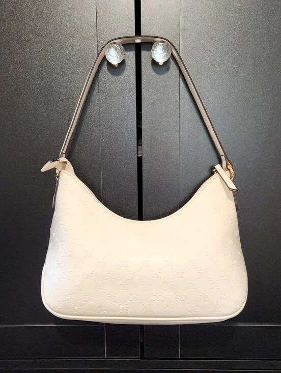 The Juicy Couture Hobo Shoulder Bag.