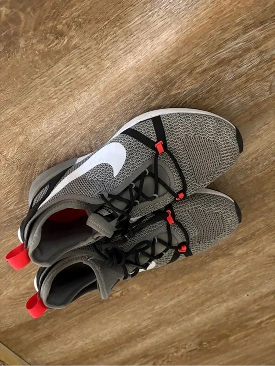 Nike Gray Mesh Running Shoes with White Swoosh and Red Interior