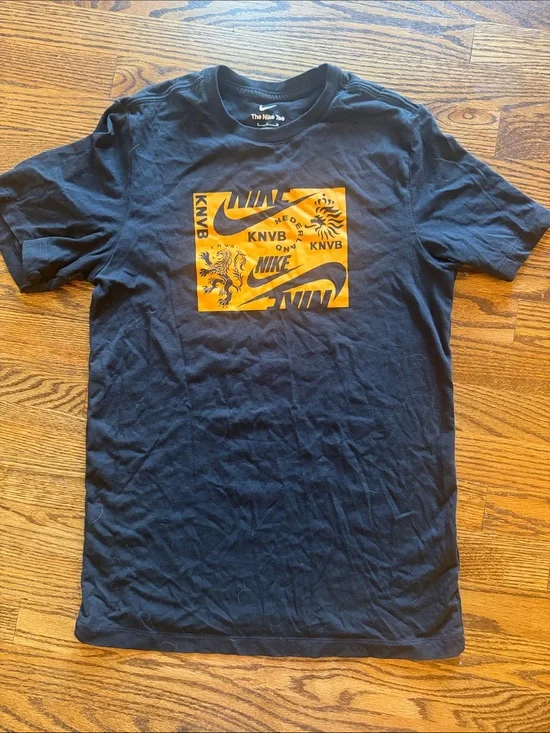 Nike Men’s Black T-Shirt with Orange Chest Graphic