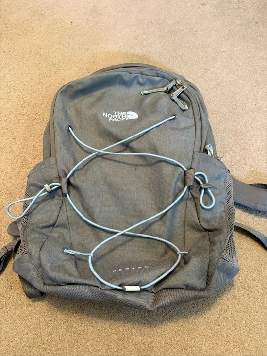 The North Face Gray Women’s Backpack with Light Blue Bungee