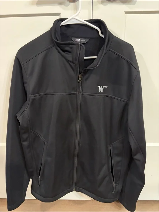 The North Face Men's Black Lightweight Softshell Jacket with Zip Pockets.