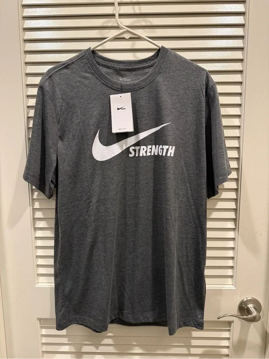 Nike Gray 'Strength' Short Sleeve Crew Tee with White Swoosh