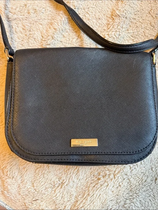 kate spade black crossbody with gold plaque