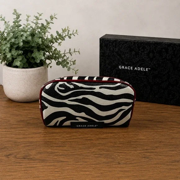 NWOT Grace Adele Zebra Print Cosmetic Bag Black‎ White Red Faux Leather Case