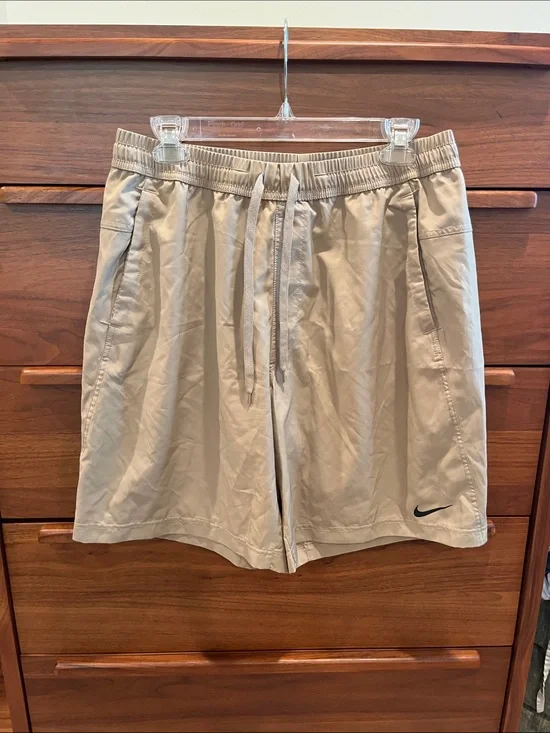 Nike Men’s Beige Athletic Shorts with Black Swoosh
