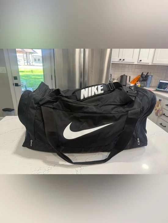 Nike Large Black Duffel Bag with White Swoosh and Logo Strap
