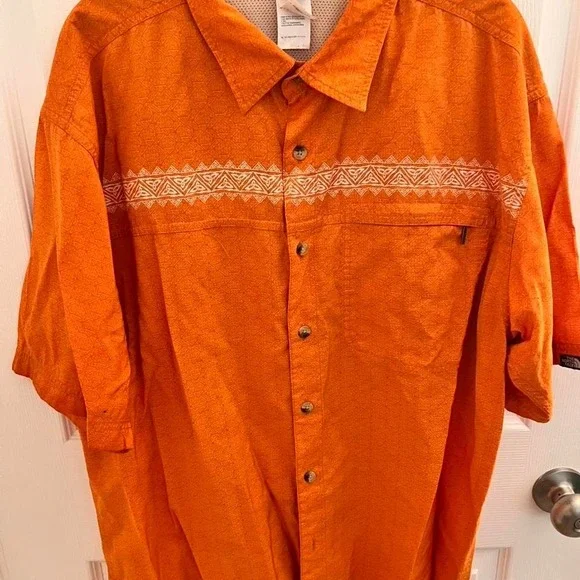 The North Face Orange button-up shirt with a boho vibe‎