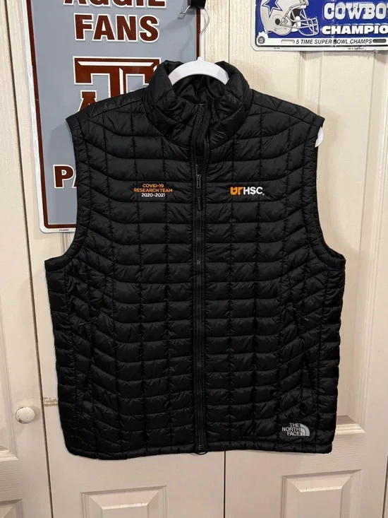 The North Face Black Quilted Puffer Vest with UT HSC Embroidery
