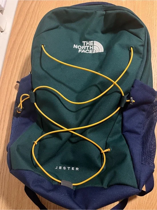 The North Face Jester Backpack in Forest Green with Yellow Accents