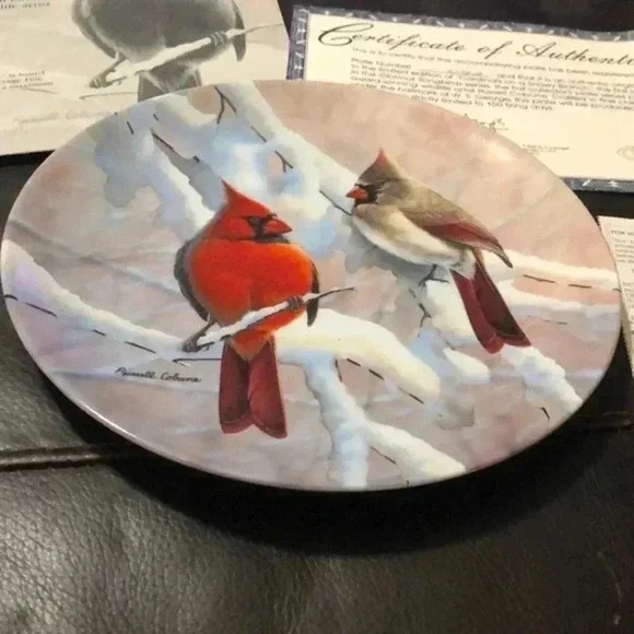 Cardinals on‎ a snowy branch collector plate
