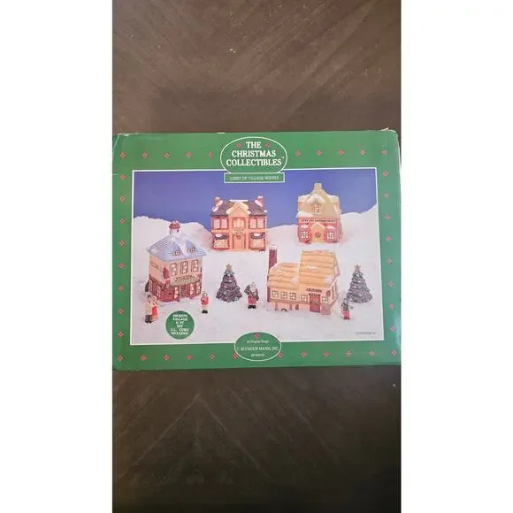 New In Box The Christmas Collectibles by Seymour Mann 11 piece light up houses‎