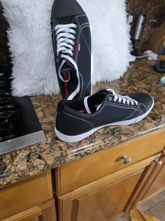 Levi's Men's Black Canvas Low-Top Sneakers with White Accents and Red Tab