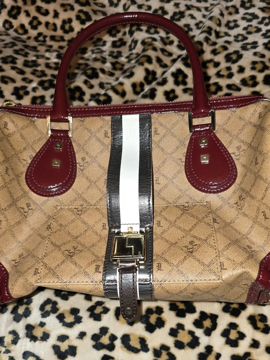 This is a L.A.M.B. by Gwen Stefani monogram Boston bag