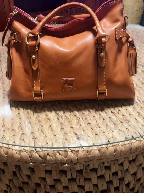 Dooney & Bourke  Leather Satchel in the color natural. The old large size.