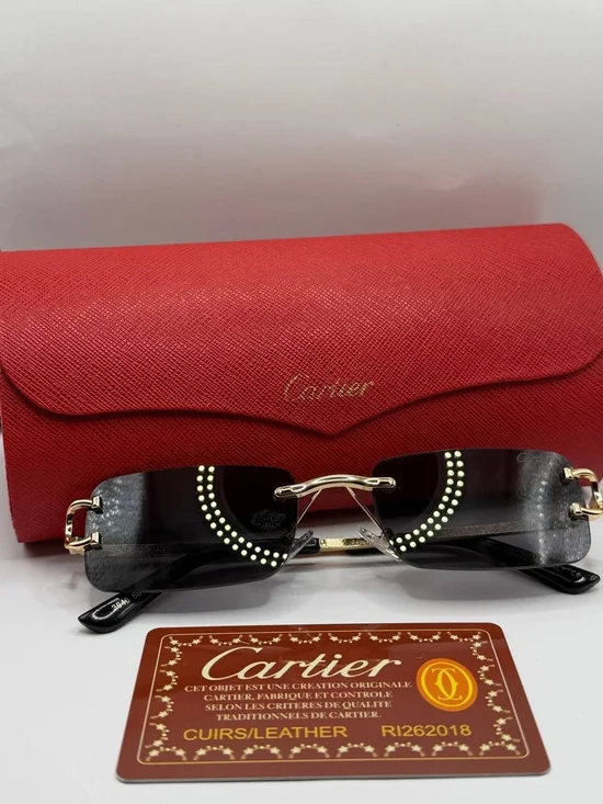 Cartier Black Rimless Sunglasses with Gold Accents - Black