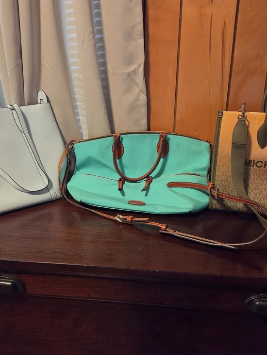 Michael Kors, Kate Spade And Dooney And Burke