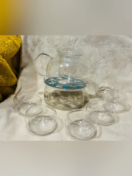 Shou Gong 27 oz glass filtering tea maker teapot with a warmer and 6 tea cups