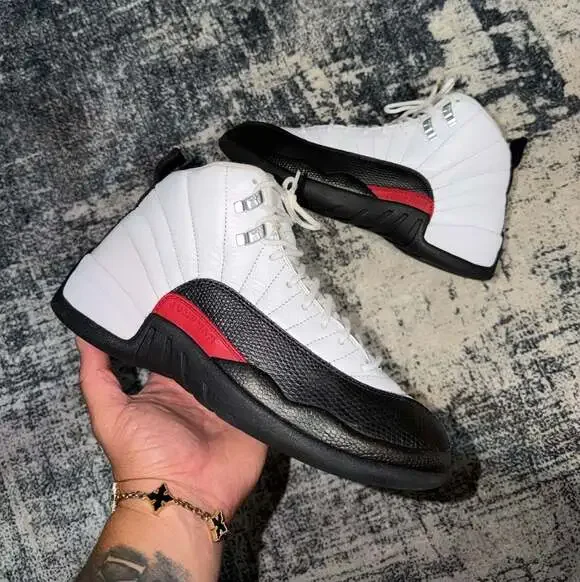 Size: 7.5y- Air Jordan 12 Retro 'Taxi Flip'