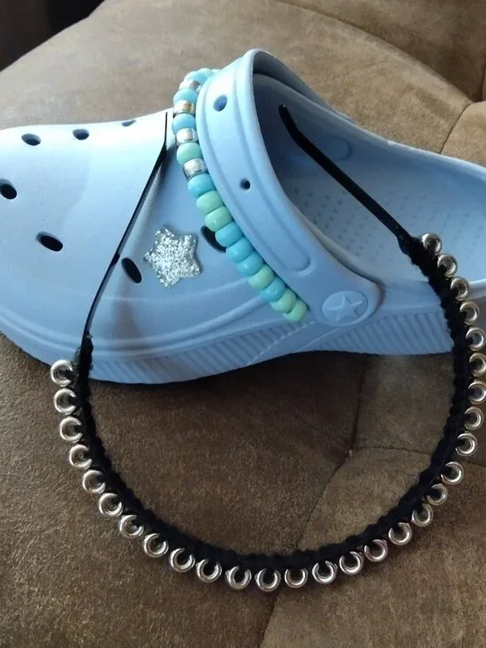 Embellished blue plastic shoes for kids with matching hair band.